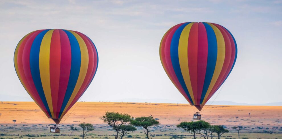 Hot Air Balloon Rising Above The Savannah Serengeti National Park AdobeStock 377726378 1536x1024 1 990x490